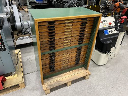 Typographic bookcase for typesetting Buchbindereimaschinen