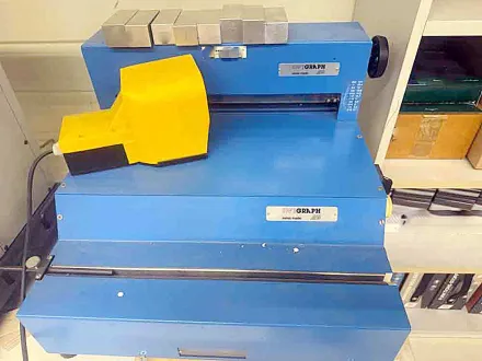 Swigraph/Ibico E420C/EP28 Stanz- und Drahtschließmaschine – RESALE