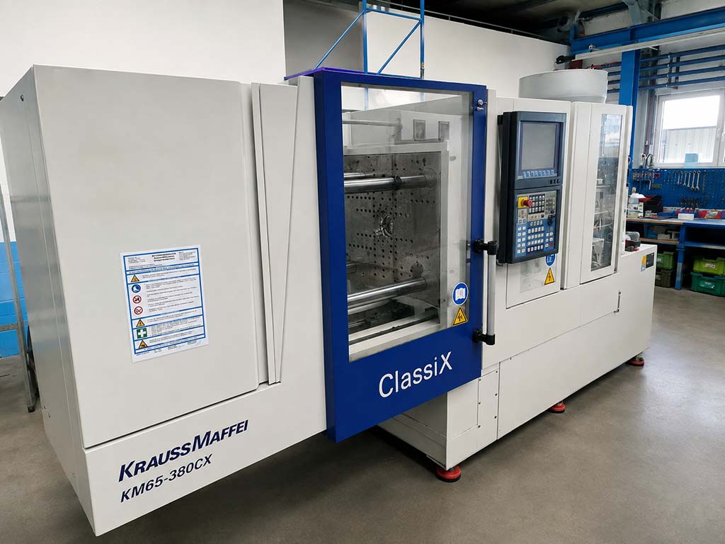 Krauss Maffei KM 65-380 CX Spritzgießmaschine