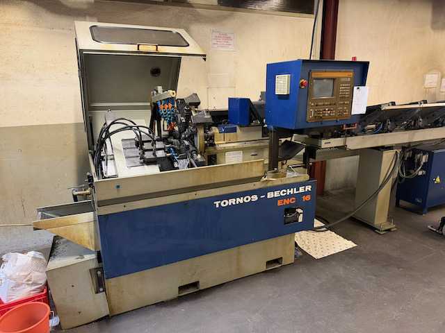 1990 Tornos ENC 16 – CNC-Drehbank mit Tornos-Stabzufuhr