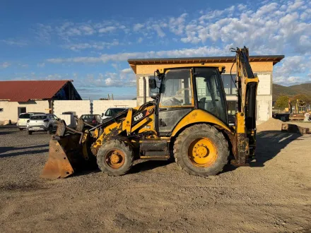 Caterpillar 428F Baggerlader – RESALE