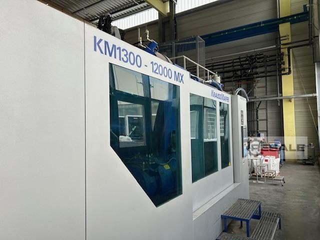 Krauss Maffei KM 1300-12000 MX inkl. Roboter Spritzgiessmaschinen – RESALE
