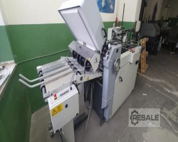Maschine: HEIDELBERG Stahlfolder TI52/4. Taschenfalzmaschinen