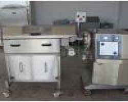 Maschine: HANDTMANN  Linie für Wolfskopf und automatisches Band