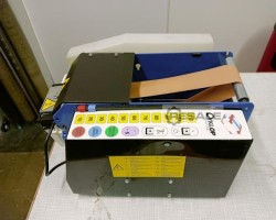 Maschine: CYCLOP Lapomatik Streifengeber Nassklebeband