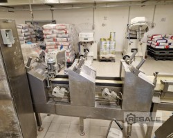 Maschine: KOMAR laminating line Ausrollmaschinen