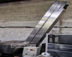 Maschine:   Verschlusskappenförderer