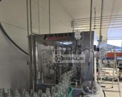 Maschine: FRAMAX Uniwersal Robots Abfüll- und Verpackungsanlagen