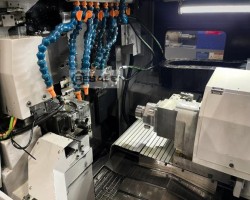 Maschine: TORNOS Delta 38/5 CNC Langdrehmaschinen