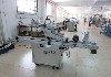 Maschine: CBV 140-L Deckeletikettierer