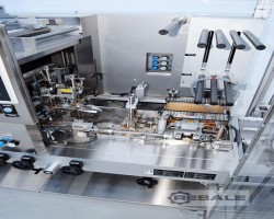 Maschine: PESTER PEWO-fold 1 Compact Folienschrumpfanlagen