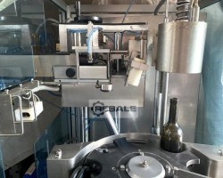 Maschine: NORTAN Unicap 35 Kapselaufsetzer + Schrumpfkopf