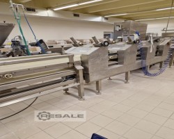 Maschine: KOMAR laminating line Ausrollmaschinen