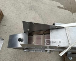 Maschine: NEUHäUSER  Verschlusszuführung