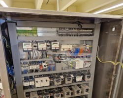 Maschine: KOMAR laminating line Ausrollmaschinen