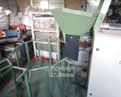 Maschine:   Portionier- und Einwickelmaschinen