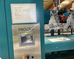 Maschine: PROJECT AUTOMATION + ENG. PROGRIP TX 240 Tragegriff-Applikator Schrumpffolier-Multipack