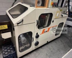 Maschine: DEKAPACKER SPK 4-35 Folieneinschlaglinie für Mailings mit - Schrumpfbottich