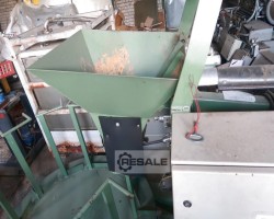 Maschine:   Portionier- und Einwickelmaschinen