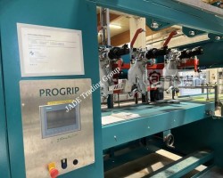 Maschine: PROJECT AUTOMATION + ENG. PROGRIP TX 240 Tragegriff-Applikator Schrumpffolier-Multipack