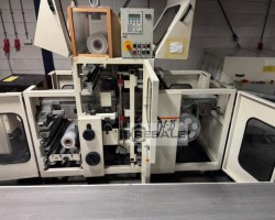 Maschine: DEKAPACKER SPK 4-35 Folieneinschlaglinie für Mailings mit - Schrumpfbottich