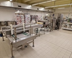 Maschine: KOMAR laminating line Ausrollmaschinen