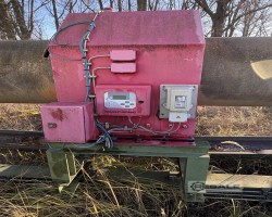 Maschine: MESUTRONIC Metron 05, 600 mm Rundholz - Metallsuchspule mit Fördertechnik