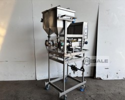 Maschine: RIGGS 1000 Zwillingskopf-Einzahler