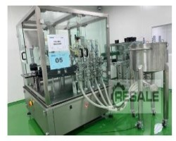 Maschine:   Automatische Füll- und Etikettiermaschine